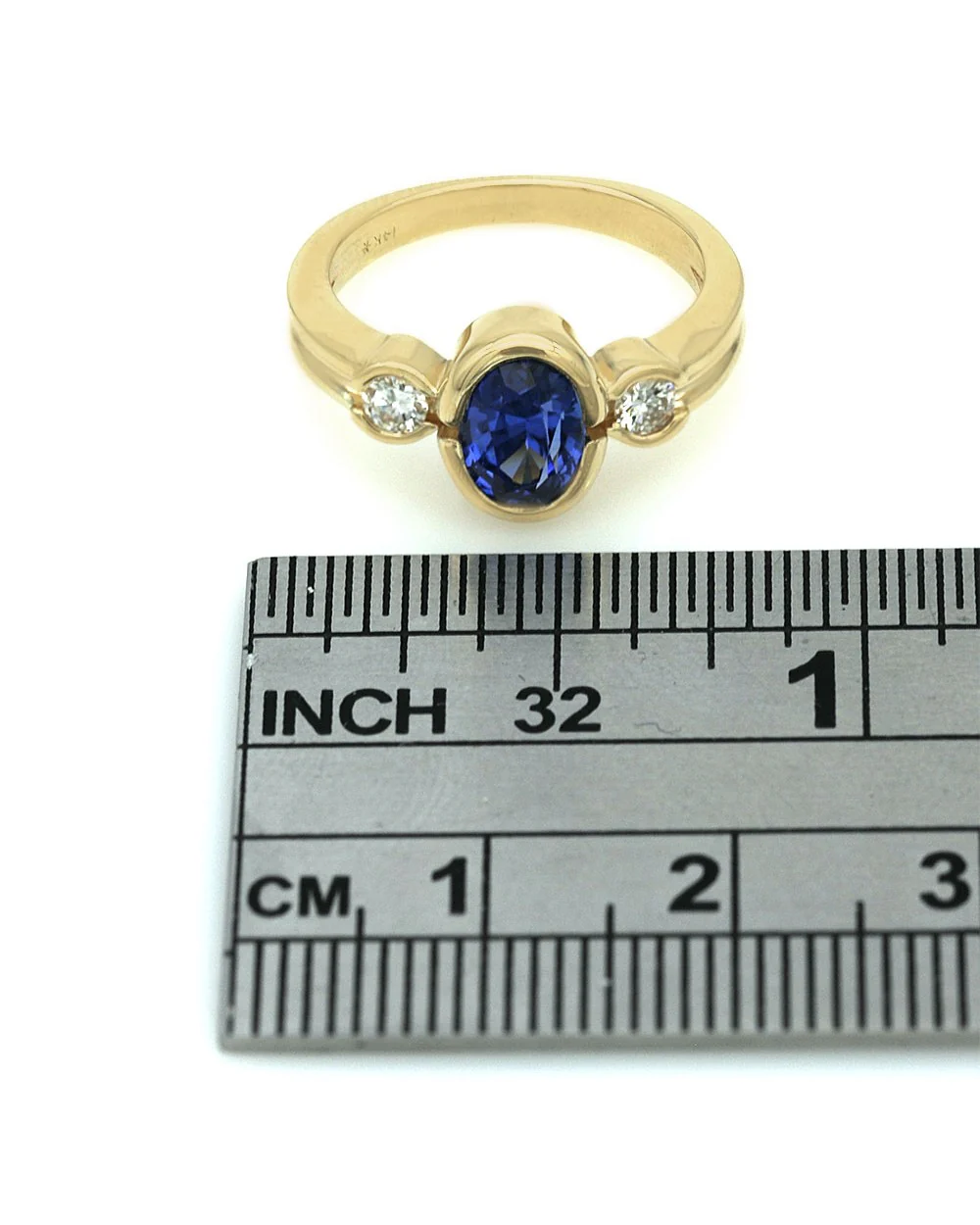 Blue Sapphire and Diamond Accent Ring in Yellow Gold - Image 3